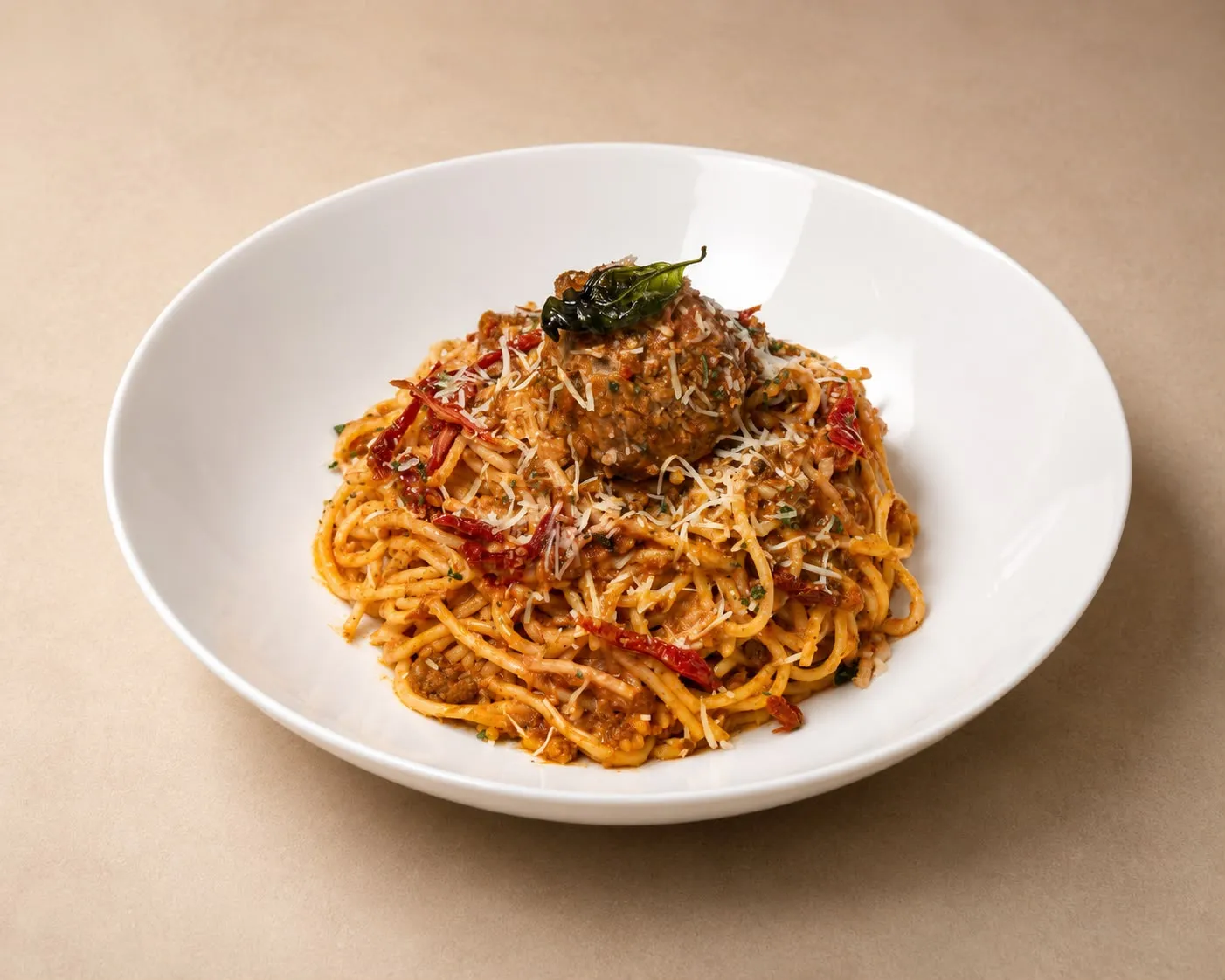 Spaghetti Bolognese with a meatball and shaved parmesan at The House on Queen&rsquo;s (HQ) in downtown London, Ontario