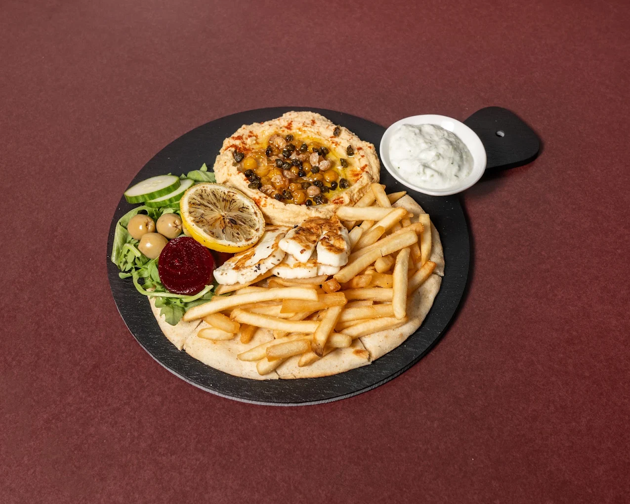 Shareable hummus, halloumi and warm pita board at The House on Queen&rsquo;s (HQ) in downtown London, Ontario
