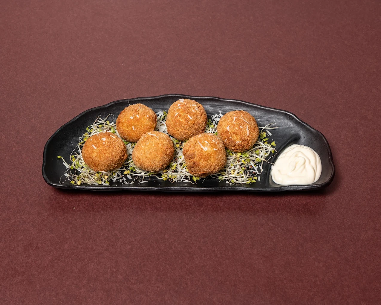Jalape&ntilde;o Bomb Squad &mdash; crispy cheese-stuffed bites with garlic aioli at The House on Queen&rsquo;s (HQ) in downtown London, Ontario
